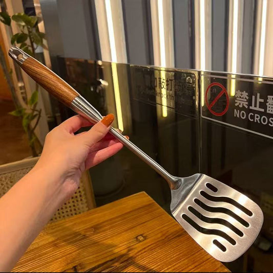 Stainless steel frying spatula with pearwood handle